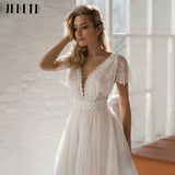 Runhufu Cap Sleeve Boho Wedding Dresses Backless Lace Appliques Beach Bride Gowns Robe De Mari¨¦e Dot Tulle V-Neck Sweep Train