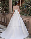 Runhufu Strapless A-Line Satin Wedding Dresses Off the Shoulder Sleevesless Sweep Train Bridal Gowns