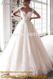Runhufu Bling Ball Gown Wedding Dresses Nude Tulle Neck Cap Sleeves Lace Applique Corset Buttons Sweep Train Bridal Gowns
