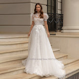 Runhufu O-Neck A-line Wedding Dresses Puff Sleeve Flower Open Back Floor Length Appliques Bridal Gown Vestidos De Novia